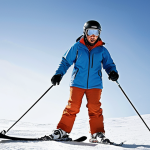 ** A beginner skier struggling with long, stiff skis that are too advanced for their skill level. They look frustrated and unsteady on the snow. **Keywords:** beginner skier, oversized skis, struggling, frustration, learning curve, snow.

**